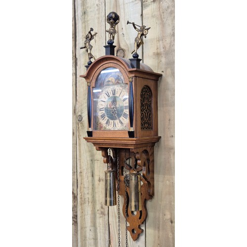 522A - German wall clock, comes with pendulum and weights.