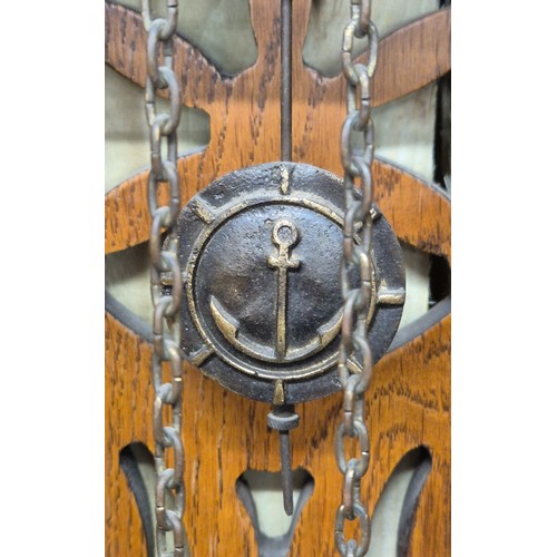 522A - German wall clock, comes with pendulum and weights.