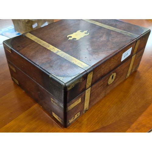 419 - 19th century mahogany and brass bound jewellery box containing lidded preserves. [13x30x22cm]