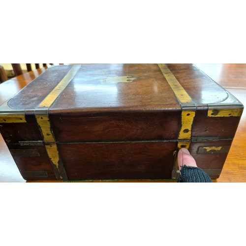 419 - 19th century mahogany and brass bound jewellery box containing lidded preserves. [13x30x22cm]