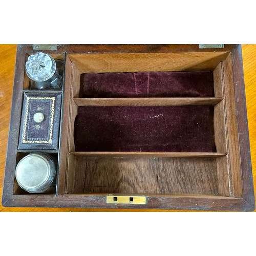 419 - 19th century mahogany and brass bound jewellery box containing lidded preserves. [13x30x22cm]