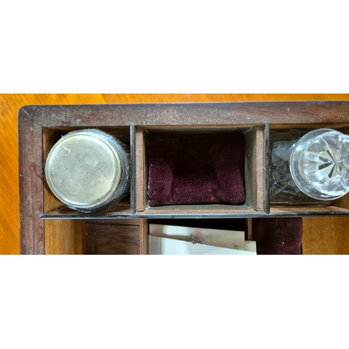 419 - 19th century mahogany and brass bound jewellery box containing lidded preserves. [13x30x22cm]