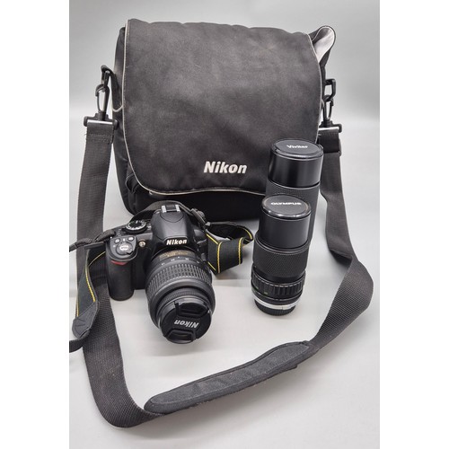 260 - Nikon model 3100 digital camera with spare lenses & bag; Vivatar & Olympus lenses