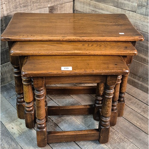 259 - Heavy Nest of Antique style Oak tables [47.5x61x32cm]