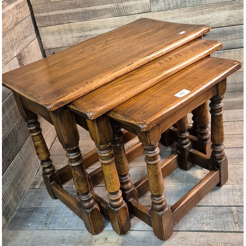 259 - Heavy Nest of Antique style Oak tables [47.5x61x32cm]