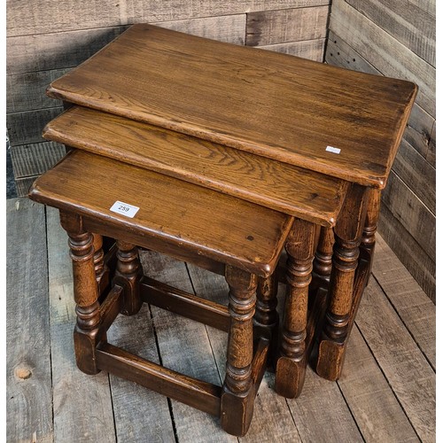 259 - Heavy Nest of Antique style Oak tables [47.5x61x32cm]