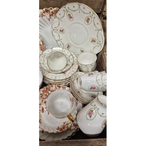 320 - A crate of vintage tea ware; Aynsley flower pattern tea service, Limoge flower pattern tea service &... 