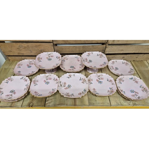 322 - Victorian pink ground and floral design cake plate service with tazza bowls.