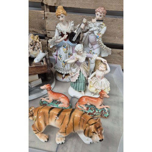 323 - A selection of collectables; Royal Dux tiger, pair of Staffordshire small dog figures & other items