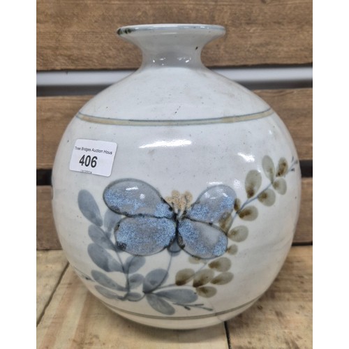 406 - Studio Pottery floral and moth design bulbous vase. [22.5cm high]