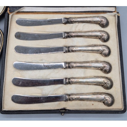 5 - Two boxed silver cutlery lots; Boxed Sheffield silver handle butter knives. Five Sterling silver tea... 