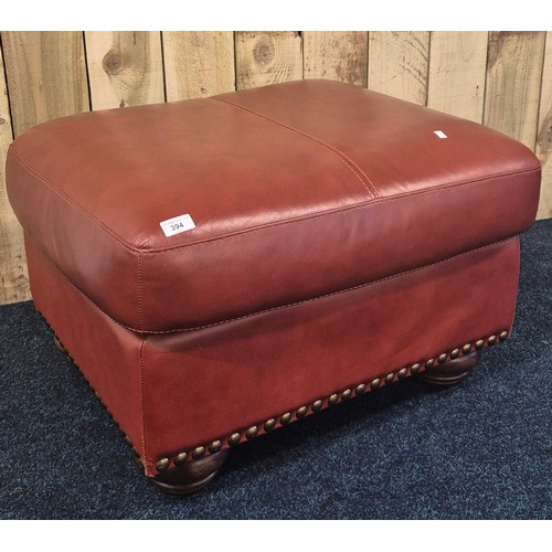 394 - Brown rustic leather footstool. [45x75x65cm]