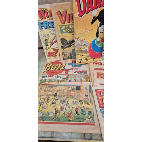 457 - A collection of kids 1970s cartoon magazines; buzz issue 1,The Beano,  The Beezer & topper, The Dand... 