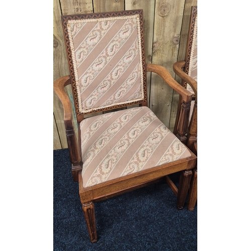 395 - A Pair of early 20th century open arm chairs