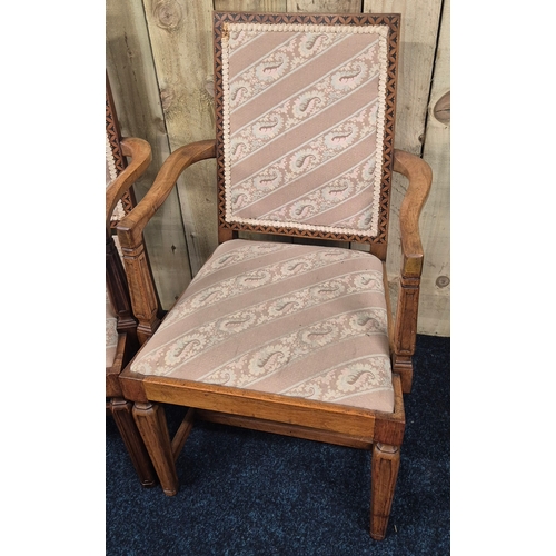 395 - A Pair of early 20th century open arm chairs