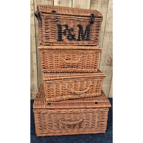 398 - A collection of four vintage F&M wicker baskets