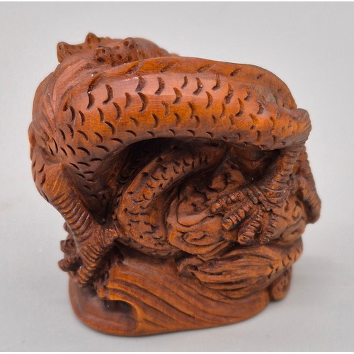 56 - Japanese hand carved boxwood netsuke in the form of two dragons huddled together. Signed. [4.5cm hig... 