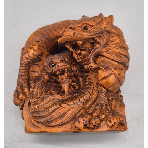 56 - Japanese hand carved boxwood netsuke in the form of two dragons huddled together. Signed. [4.5cm hig... 