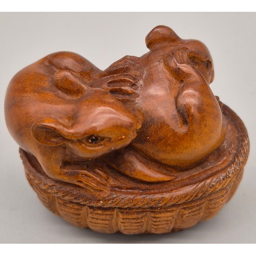 51 - Japanese hand carved boxwood netsuke in the form of a pair of mice within a basket. Signed. [4.5cm l... 