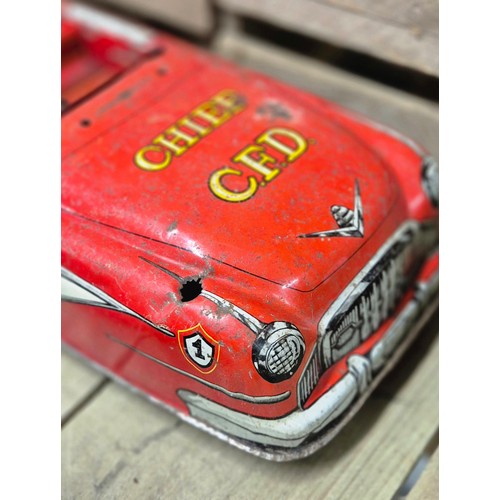 338 - Four tin plate model toys; Butterfly, Chief C.F.D. Large car model, Truck model and Japanese made T.... 