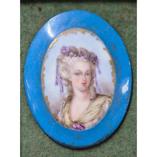 340 - Pair of Victorian porcelain painted portraits. Fitted within ornate moulded gilt frames. [Frames- 30... 