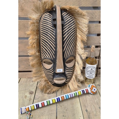 329 - African Bead worked Knobkerrie war club and large carved wooden wall mask. [Club- 52cm length]