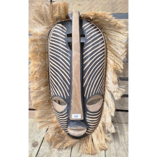 329 - African Bead worked Knobkerrie war club and large carved wooden wall mask. [Club- 52cm length]