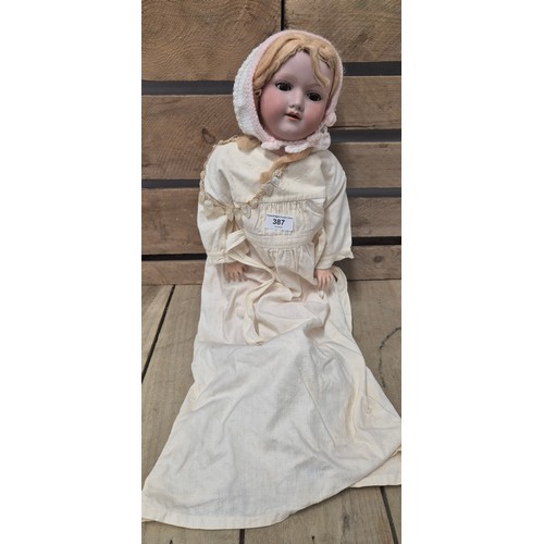 387 - Antique Armand Marseille Germany Bisque head doll. 390 A.7.M. Having movable joints. Various loose g... 