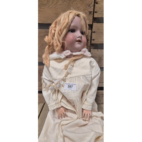 387 - Antique Armand Marseille Germany Bisque head doll. 390 A.7.M. Having movable joints. Various loose g... 