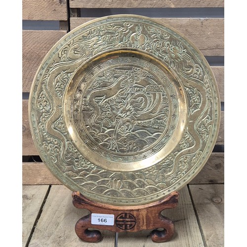 166 - Heavy antique Chinese Gilt brass/ bronze dragon design shallow bowl with wooden display stand. [33cm... 