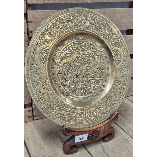 166 - Heavy antique Chinese Gilt brass/ bronze dragon design shallow bowl with wooden display stand. [33cm... 