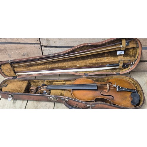 161 - Leather case violin and two bows; English Violin, 1880's. Full size. Unlabelled. Back Length 359m. T... 