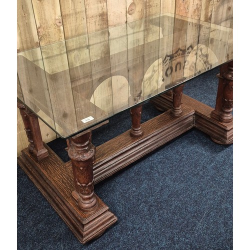 415 - 19th century Cathedral arched based table with Glass top [64.5x124x75cm]