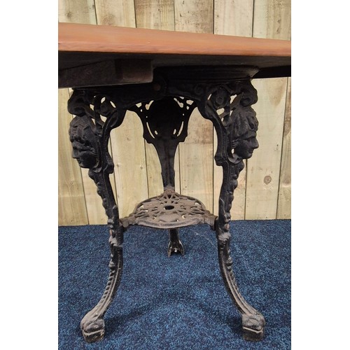 425 - Cast Iron base garden table. Square form solid wood top section. [69.5x75cm]