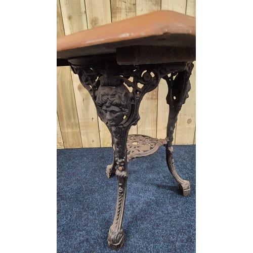 425 - Cast Iron base garden table. Square form solid wood top section. [69.5x75cm]