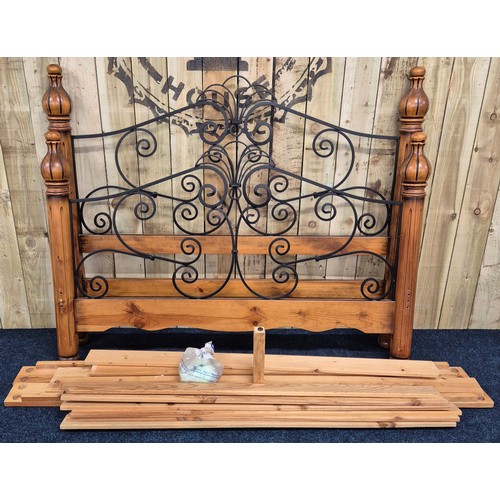 440 - Antique style Pine King size bed frame with wrought iron supports.