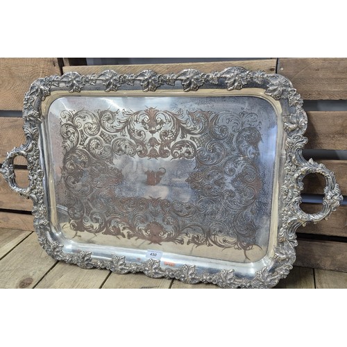 450 - A Large Silver plated Ornate butlers two handle serving tray [76x44cm]