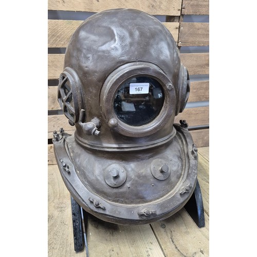 167 - Replica light weight resin bronzed divers Helmet with stand. [49cm high]