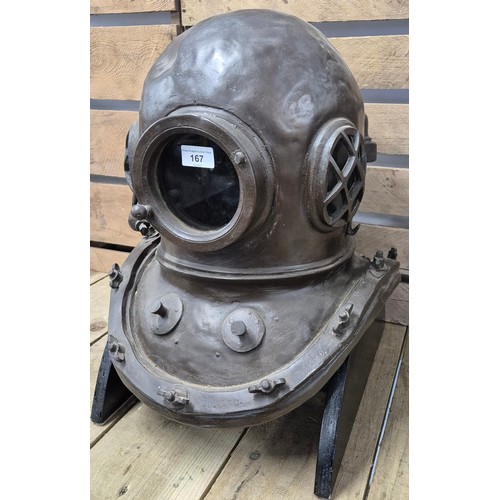 167 - Replica light weight resin bronzed divers Helmet with stand. [49cm high]