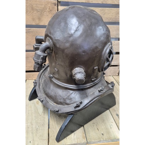 167 - Replica light weight resin bronzed divers Helmet with stand. [49cm high]