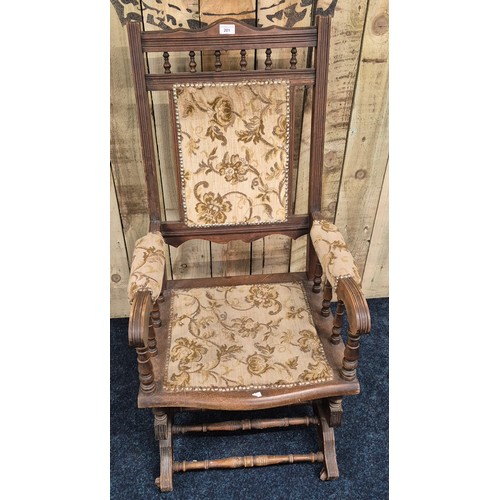 201 - Antique American Rocking arm chair