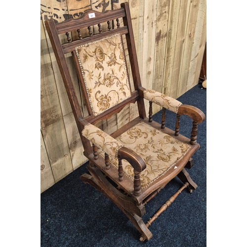 201 - Antique American Rocking arm chair