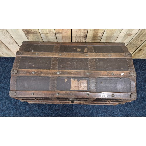 210 - Antique Saratoga dome top trunk [58x91x50cm]