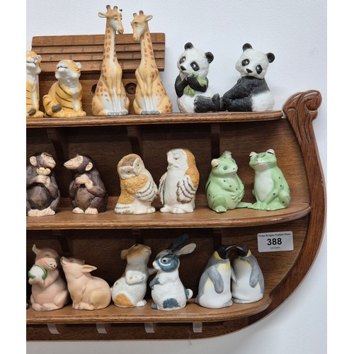 388 - Franklin Mint Noah's Ark Salt & Pepper animal sets. Comes with wooden Noah's Ark shelving rack.