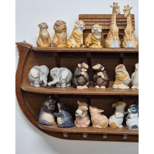 388 - Franklin Mint Noah's Ark Salt & Pepper animal sets. Comes with wooden Noah's Ark shelving rack.