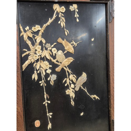 156 - A Pair of Japanese Meiji period wall hanging panels; Both depicting birds perched on floral branches... 