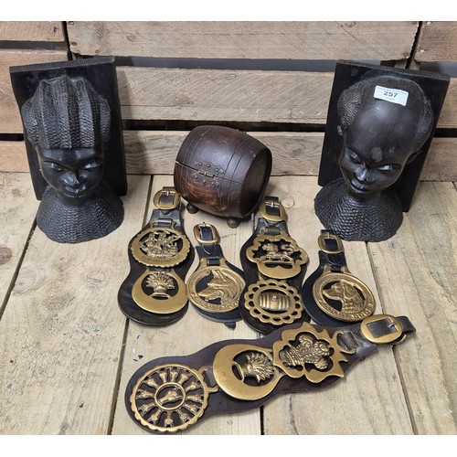 257 - A Pair of heavy African bust book ends, antique barrel tea caddy containing vintage stamps together ... 