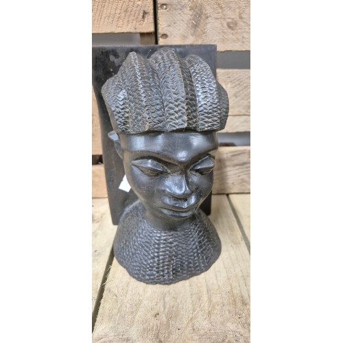 257 - A Pair of heavy African bust book ends, antique barrel tea caddy containing vintage stamps together ... 