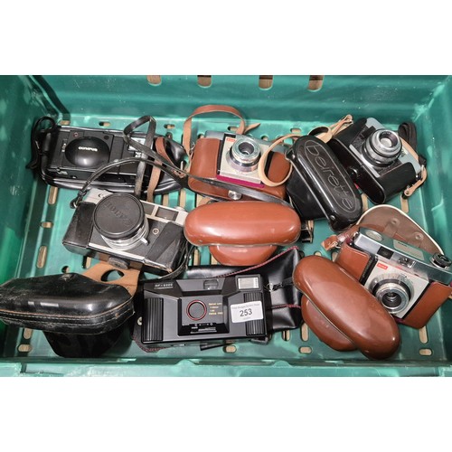 253 - A collection of six vintage Cameras; Cannon QL camera, Olympus A11 camera, two kodak colour snap 35 ... 