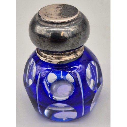 63 - Antique Blue over lay glass and 925 silver perfume bottle. Stopper still present. [4.7cm high]